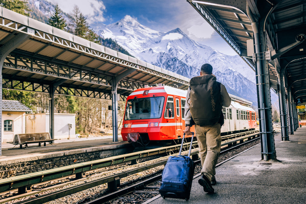 A man strolls through a train station at Chamonix