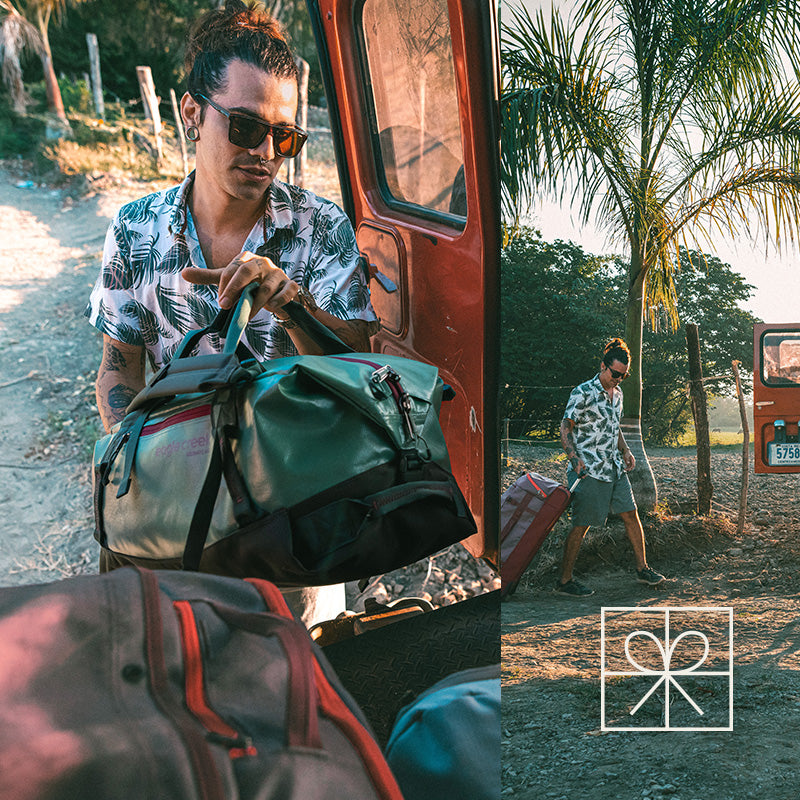 A man loads a vehicle with Eagle Creek duffel bags